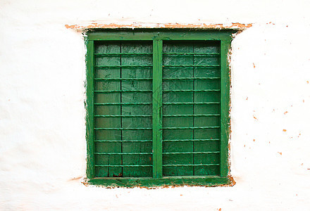 墙上旧颜色的木板窗棕色框架绿色城市白色建筑风化木头建筑学街道图片