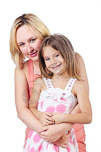快乐的妈妈和女儿在白色乐趣孩子童年母性母亲女士微笑父母拥抱喜悦图片