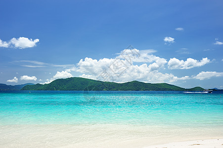 海滩天空蓝色海洋黄色海岸线旅行热带海浪地平线海景图片