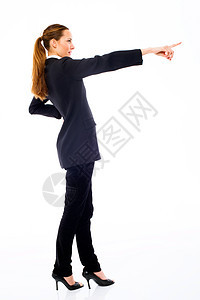 青年女商务人士站在她的手旁 用白b表示员工商务年轻人工作职业装女士短剑棕色成人头发图片