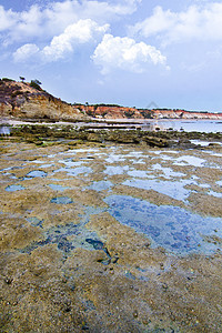 奥尔霍斯达阿瓜 阿尔加夫海滩阳光多云旅行水池海岸线海洋悬崖岩石支撑图片