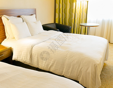 内部设计生活商业亚麻壁橱枕头床单风格寝具家庭桌子图片