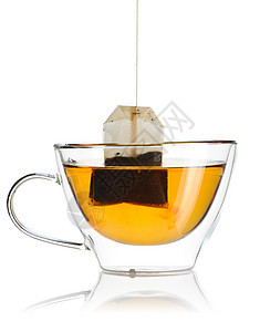 热茶液体黑色玻璃黄色茶包饮料草本餐具白色叶子图片