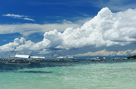 美丽的海滩边缘假期荒野蓝色海岸线海洋海景天空旅行风景图片