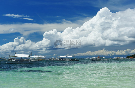 美丽的海滩边缘假期荒野蓝色海岸线海洋海景天空旅行风景图片