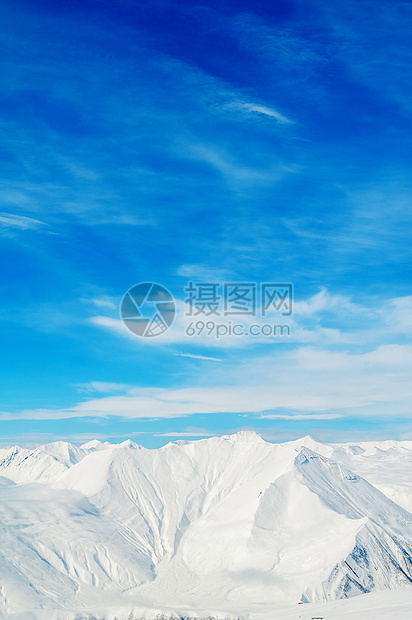 明亮的冬天天雪山白色旅行天空假期阳光冰川滑雪山脉风景场景图片