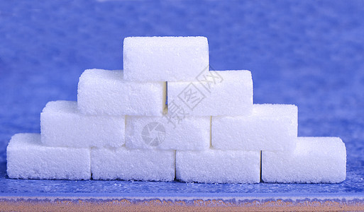 糖金字塔白色杯子蓝色味道颗粒状金字塔立方体甘蔗团体粮食图片