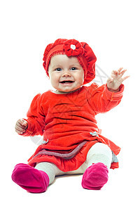 玩乐的女婴孩子手势好奇心情感微笑靴子婴儿快乐帽子衣服图片