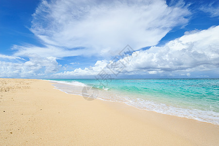 美丽的海滩热带海洋海浪冲浪风景边缘假期荒野天空海岸线图片
