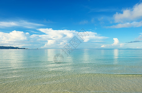 美丽的海滩海浪天空假期热带旅行边缘海景冲浪蓝色风景图片