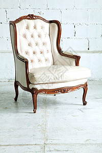 古董房沙发扶手椅皮革家具房间闲暇砖墙木头装潢长椅装饰图片