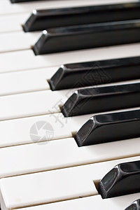 旧钢琴键盘旋律音乐黑色钥匙宏观电子歌曲笔记乐器白色图片