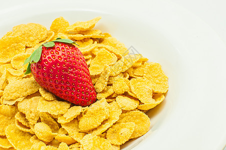 含有草莓的谷物薄片食物甜点奶制品玉米早餐水果饮食美食营养图片