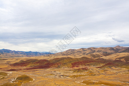 油漆山丘土地红色悬崖峡谷石层岩石化石水平山岗图像高清图片