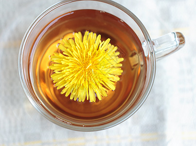 茶杯和鲜花茶碗花朵输液饮料药品叶子食物桌子草本植物植物图片