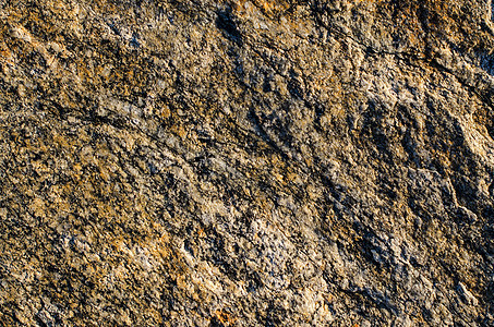 岩石纹理表面材料棕色裂纹花岗岩石头石英矿物粒状大理石废墟图片