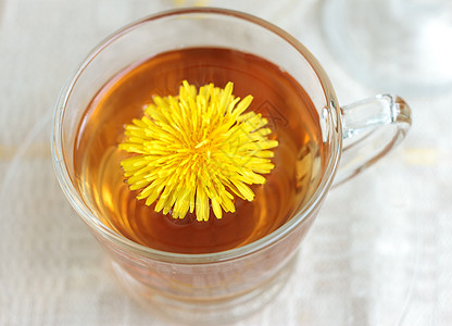 茶杯和鲜花食物桌子药品草本植物玻璃衬套植物饮料花朵叶子图片