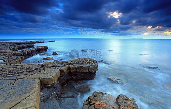 海湾波浪海浪海洋侏罗纪日落蓝色风景海岸目的地海滩图片