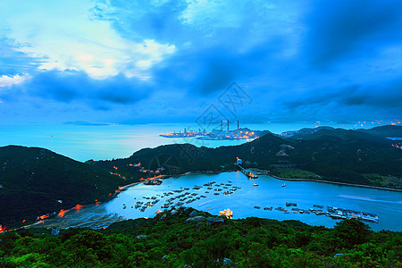 风景 日落在山上和海面上反射旅行天气天空假期太阳海岸墙纸晴天热带图片