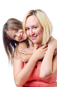快乐的妈妈和女儿在白色女性父母家庭乐趣拥抱母亲童年孩子微笑母性图片