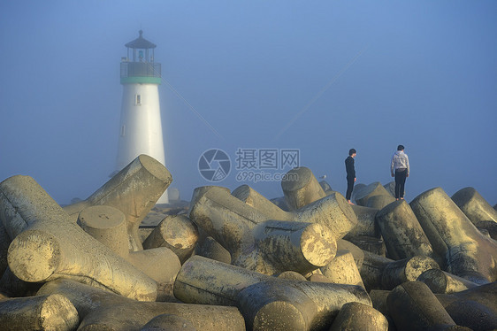 沃尔顿灯塔反射支撑蓝色公园旅游建筑学旅行海岸线导航假期图片