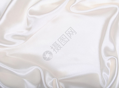 作为婚礼背景的平滑优雅白色丝绸纺织品海浪投标材料织物布料银色涟漪新娘折痕图片