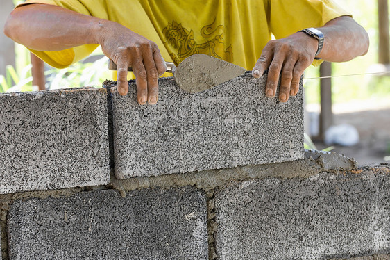 砖层石头工人工作建筑工匠水平建设者砂浆男人贸易图片