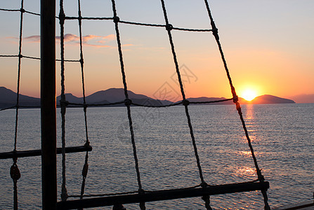 日出桅杆工艺海岸航海航行风景太阳旅行索具血管图片