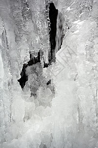 冬季冰白色灯塔岩石瀑布信标冰柱季节图片