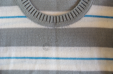 Knit 羊毛滑轮纹理颈洞背景纺织品材料棉布风格蓝色织物衣服套衫编织服装图片