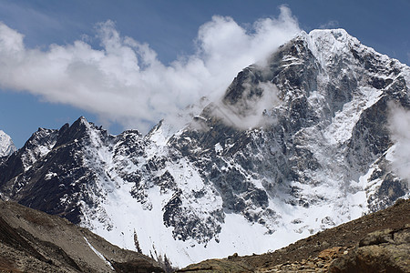 雪雪山山峰天空顶峰全景环境岩石冰川活动远足蓝色图片