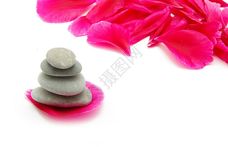 石头和花瓣温泉沉思白色治疗金字塔脆弱性鹅卵石命令卵石矿物图片