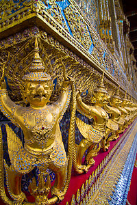 曼谷大宫金加露司艺术宗教雕像寺庙天空蓝色奢华金子旅行异国图片