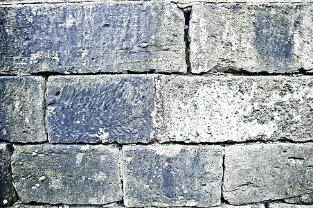 苔胱的旧墙地衣水泥风化男人建筑岩石水平灰色宏观石头图片