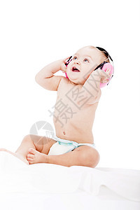 有保护耳机的可爱小婴儿喜悦女儿体积打碟机乐趣耳朵音乐派对孩子幸福图片