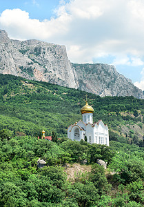 山丘教堂建筑学石头爬坡土地建筑教会悬崖岩石邻里风景图片