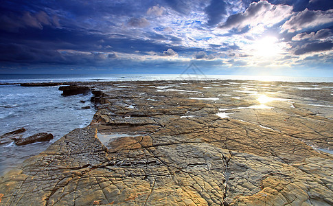 金梅里奇湾旅行蓝色海滩海岸风景岩石海岸线日落波浪目的地图片