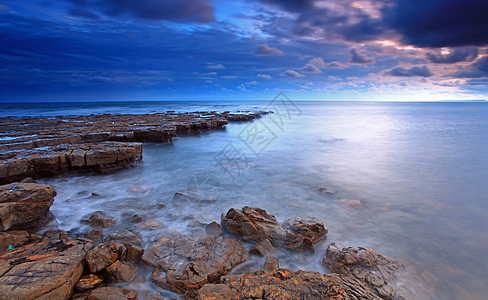金梅里奇湾目的地海浪海滩波浪旅行侏罗纪天空岩石风景日落图片