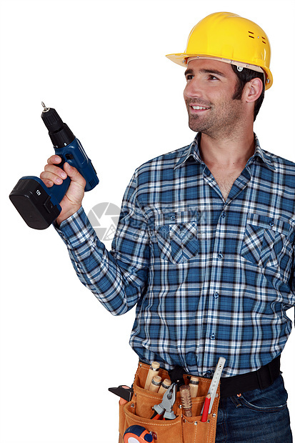 一个有钻孔的杂工贸易修理工管道电工男性电气工人建设者工具帽子图片