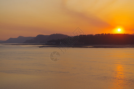 长江的阳光薄雾海洋日光辉煌海港海水辉光色调海滩仙境图片