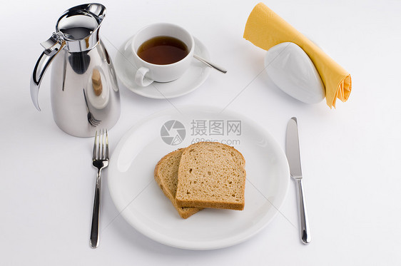 早餐桌 加热杯 白中华 橄榄 番茄和面包菜单用餐美食热水瓶桌子餐饮作品面条首席餐巾纸图片