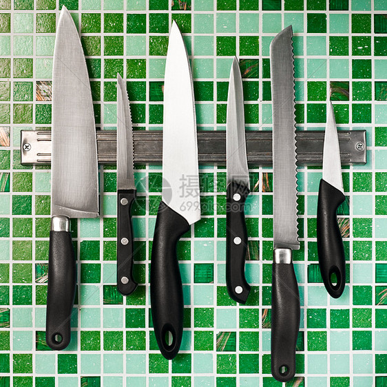 墙上的刀厨房磁铁团体厨具绿色马赛克房子塑料工具用具图片