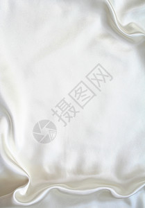 作为婚礼背景的平滑优雅白色丝绸布料纺织品投标涟漪新娘材料海浪曲线织物折痕图片