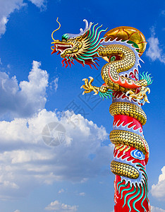 蓝色天空的龙雕像艺术警卫传统异国建筑学情调财富庆典力量动物图片