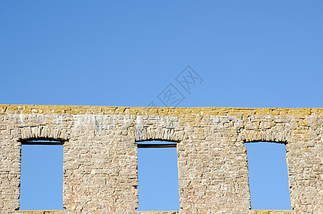 损坏窗口游客历史性石头天空旅游太阳蓝色晴天废墟城堡图片