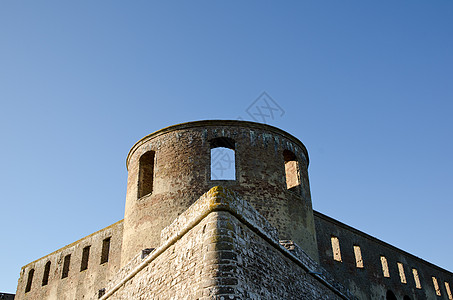 城堡废墟游客旅游蓝色天空太阳历史性石头晴天图片