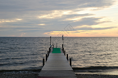 浴池码头闲暇地毯绿色海浪橙子假期日落乐趣脚步声环境图片