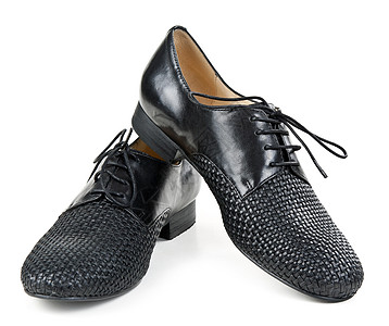 时髦的黑皮鞋工作室白色抛光鞋类配件皮革鞋带背景图片