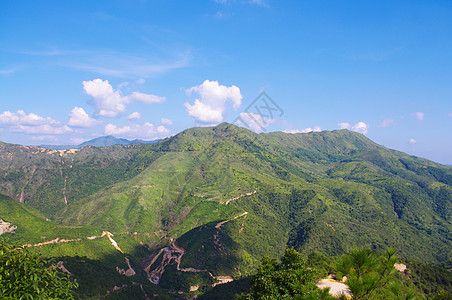 美丽的中国山吸管岩石衬套地平线石头山坡风景顶峰杂草灌木丛图片