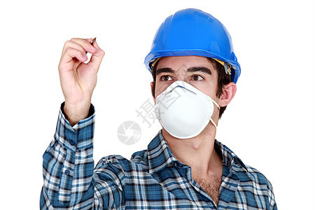 戴面罩的青年建筑工人图片